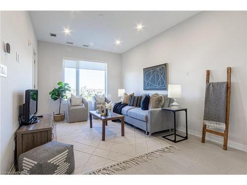 302-3265 Carding Mill Trail, Oakville, ON - Indoor Photo Showing Living Room