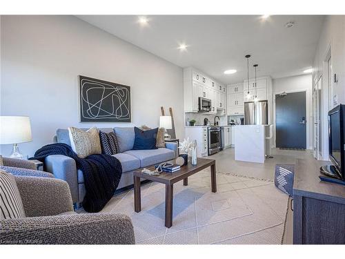 302-3265 Carding Mill Trail, Oakville, ON - Indoor Photo Showing Living Room