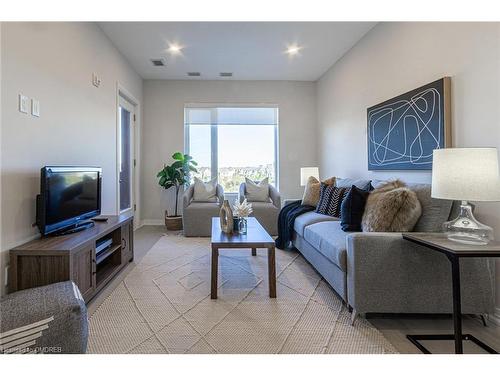 302-3265 Carding Mill Trail, Oakville, ON - Indoor Photo Showing Living Room