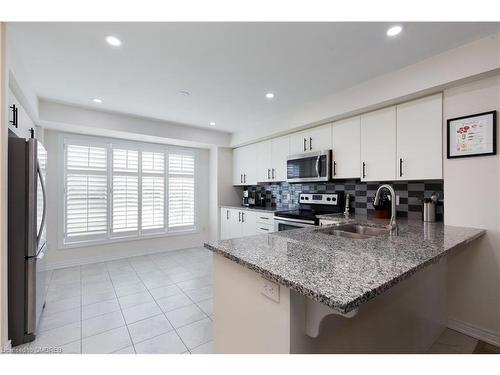 156-156 Watson Parkway North N, Guelph, ON - Indoor Photo Showing Kitchen With Double Sink