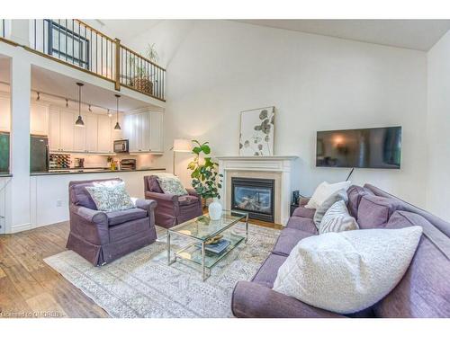 14-2141 Caroline Street, Burlington, ON - Indoor Photo Showing Living Room With Fireplace