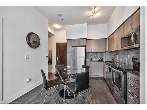 1910-55 Speers Road, Oakville, ON - Indoor Photo Showing Kitchen With Stainless Steel Kitchen With Upgraded Kitchen