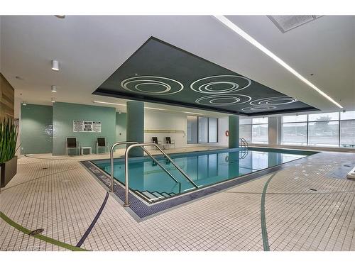 1910-55 Speers Road, Oakville, ON - Indoor Photo Showing Other Room With In Ground Pool