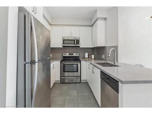 302-216 Oak Park Blvd Boulevard, Oakville, ON - Indoor Photo Showing Kitchen With Stainless Steel Kitchen With Double Sink