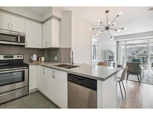 302-216 Oak Park Blvd Boulevard, Oakville, ON - Indoor Photo Showing Kitchen With Stainless Steel Kitchen With Double Sink