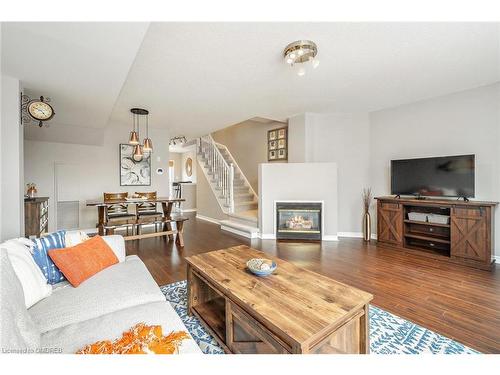 49-1489 Heritage Way, Oakville, ON - Indoor Photo Showing Living Room With Fireplace