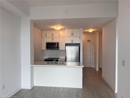 508-450 Dundas Street E, Waterdown, ON - Indoor Photo Showing Kitchen With Double Sink