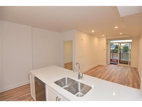 221-1936 Rymal Road E, Hamilton, ON - Indoor Photo Showing Kitchen With Double Sink