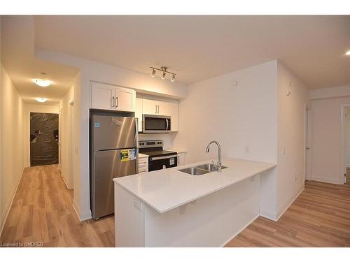 219-1936 Rymal Road E, Hamilton, ON - Indoor Photo Showing Kitchen With Stainless Steel Kitchen With Double Sink