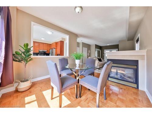 225 Andrews Trail, Milton, ON - Indoor Photo Showing Dining Room With Fireplace