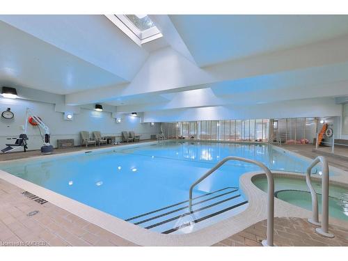 305-1903 Pilgrims Way, Oakville, ON - Indoor Photo Showing Other Room With In Ground Pool