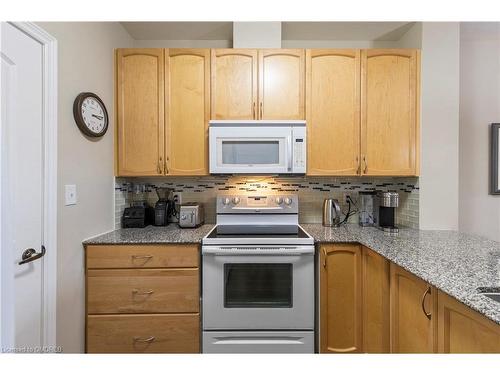 212-383 Main Street E, Milton, ON - Indoor Photo Showing Kitchen