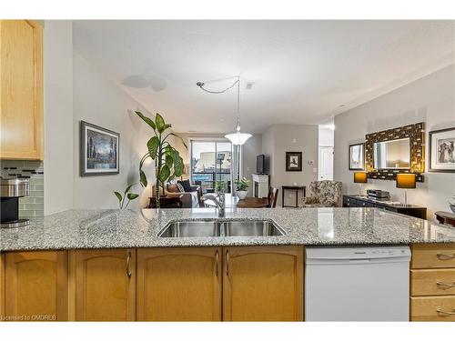 212-383 Main Street E, Milton, ON - Indoor Photo Showing Kitchen With Double Sink With Upgraded Kitchen