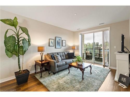 212-383 Main Street E, Milton, ON - Indoor Photo Showing Living Room