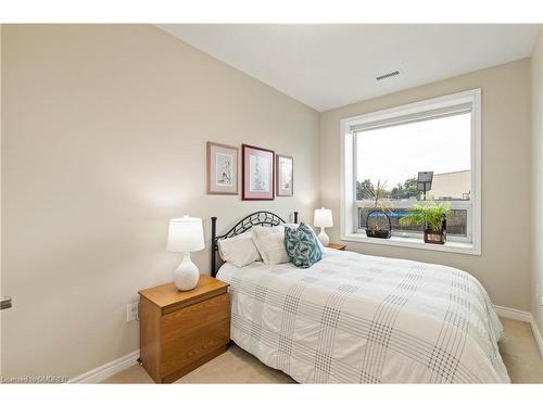 212-383 Main Street E, Milton, ON - Indoor Photo Showing Bedroom