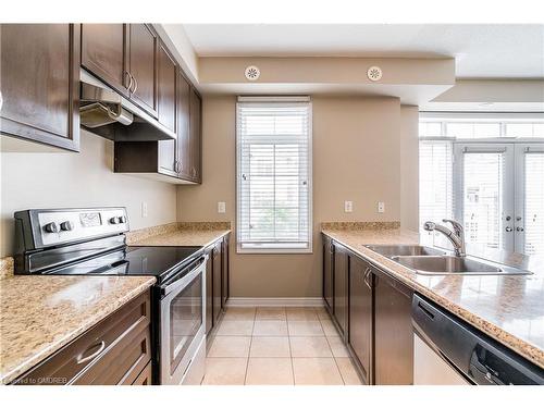 6-2435 Greenwich Drive, Oakville, ON - Indoor Photo Showing Kitchen With Stainless Steel Kitchen With Double Sink