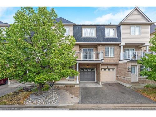 100-620 Ferguson Drive, Milton, ON - Outdoor With Balcony With Facade