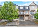 100-620 Ferguson Drive, Milton, ON  - Outdoor With Balcony With Facade 