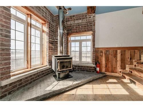 1268 Highway 6, Flamborough, ON - Indoor Photo Showing Other Room With Fireplace