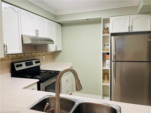 2407-100 Burloak Drive, Burlington, ON - Indoor Photo Showing Kitchen With Double Sink