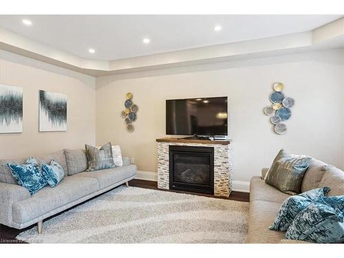 3083 Streamwood Passage, Oakville, ON - Indoor Photo Showing Living Room With Fireplace