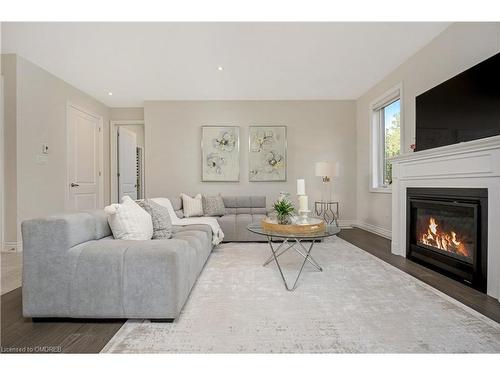 164 Harpin Way E, Fergus, ON - Indoor Photo Showing Living Room With Fireplace