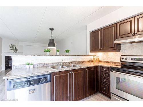 202-1479 Maple Avenue, Milton, ON - Indoor Photo Showing Kitchen With Stainless Steel Kitchen With Double Sink