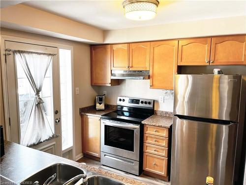 747 Challinor Terrace, Milton, ON - Indoor Photo Showing Kitchen With Double Sink