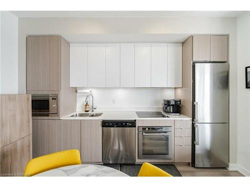 A629-5230 Dundas Street, Burlington, ON - Indoor Photo Showing Kitchen With Stainless Steel Kitchen With Double Sink