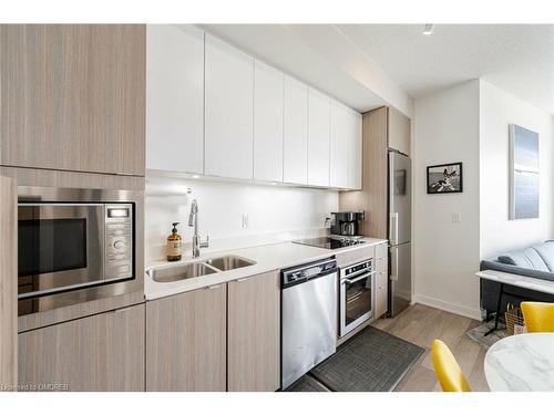 A629-5230 Dundas Street, Burlington, ON - Indoor Photo Showing Kitchen With Stainless Steel Kitchen With Double Sink