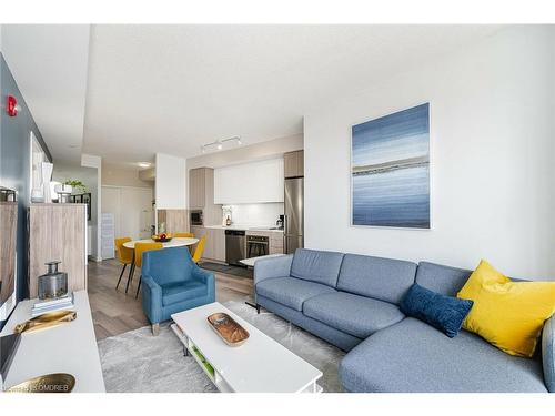 A629-5230 Dundas Street, Burlington, ON - Indoor Photo Showing Living Room