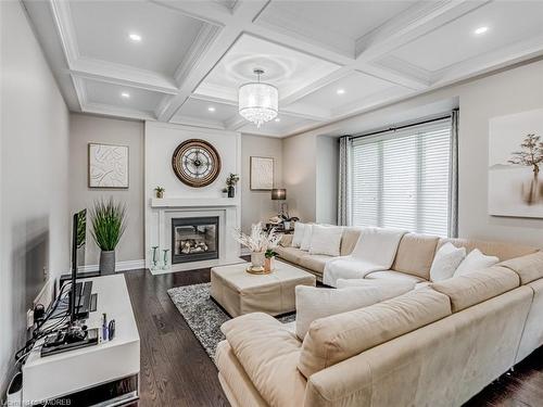 323 Mcdougall Crossing, Milton, ON - Indoor Photo Showing Living Room With Fireplace