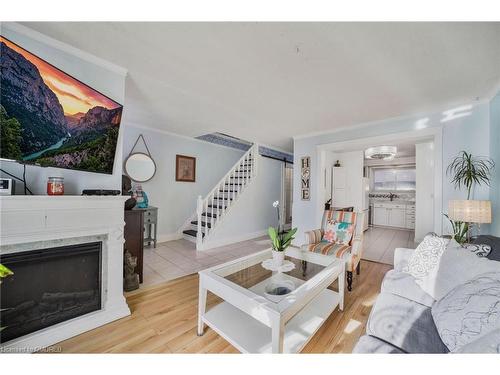 11-1110 Garth Street, Hamilton, ON - Indoor Photo Showing Living Room With Fireplace