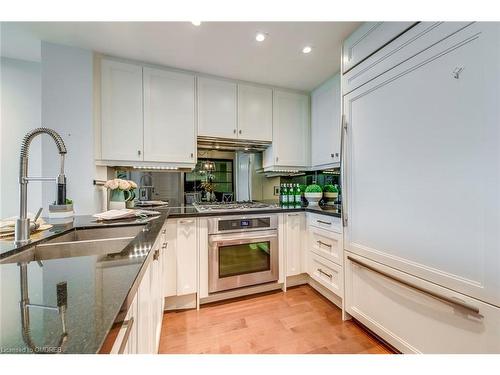 417-11 Bronte Road, Oakville, ON - Indoor Photo Showing Kitchen With Double Sink