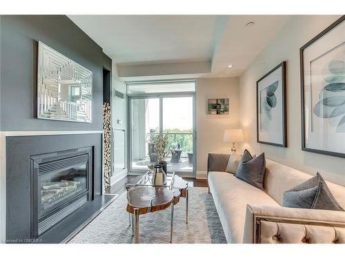 417-11 Bronte Road, Oakville, ON - Indoor Photo Showing Living Room With Fireplace