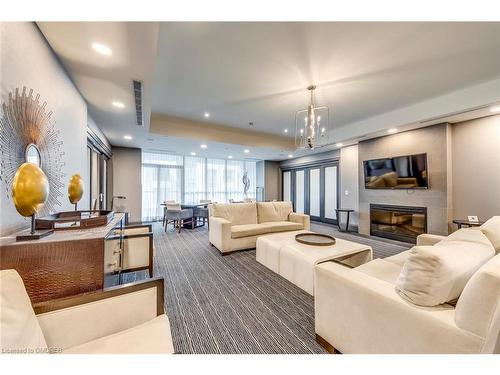 417-11 Bronte Road, Oakville, ON - Indoor Photo Showing Living Room With Fireplace