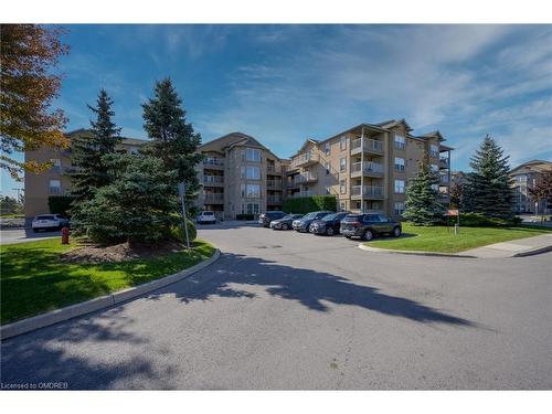 311-1470 Bishops Gate, Oakville, ON - Outdoor With Balcony With Facade