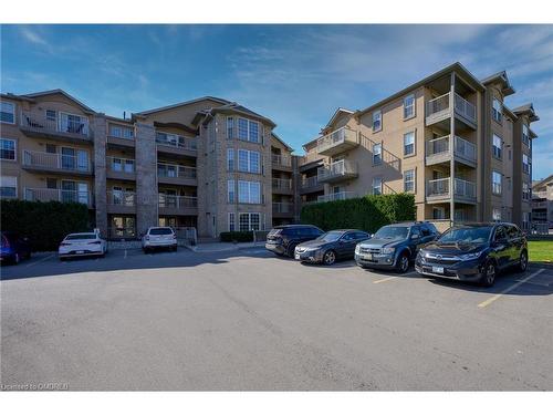 311-1470 Bishops Gate, Oakville, ON - Outdoor With Balcony With Facade