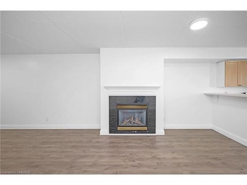 311-1470 Bishops Gate, Oakville, ON - Indoor With Fireplace