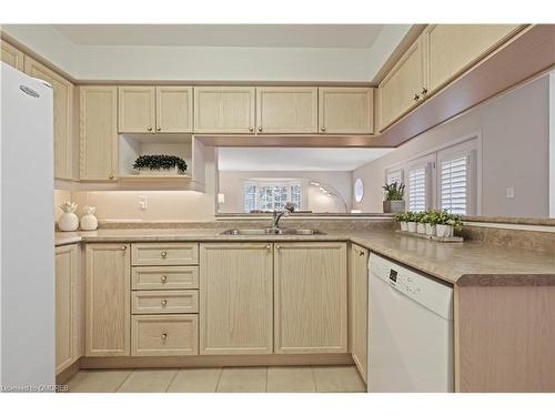 E108-216 Plains Road W, Burlington, ON - Indoor Photo Showing Kitchen With Double Sink