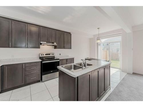 86-166 Deerpath Drive, Guelph, ON - Indoor Photo Showing Kitchen With Double Sink