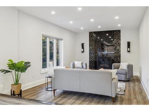 91 Oneida Boulevard, Hamilton, ON - Indoor Photo Showing Living Room With Fireplace