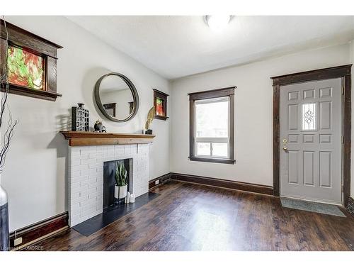 183 Rosslyn Avenue S, Hamilton, ON - Indoor Photo Showing Other Room With Fireplace