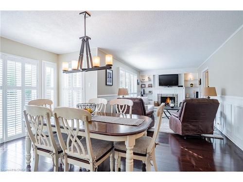 2058 Grand Boulevard, Oakville, ON - Indoor Photo Showing Dining Room With Fireplace