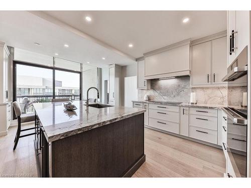 Ph2-2170 Marine Drive, Oakville, ON - Indoor Photo Showing Kitchen With Upgraded Kitchen