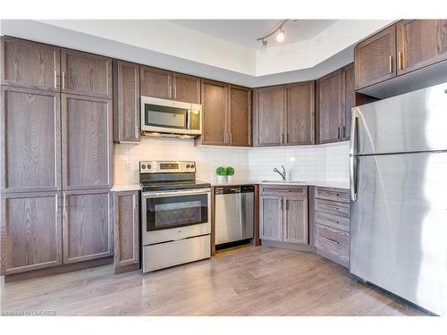 303-560 North Service Road, Grimsby, ON - Indoor Photo Showing Kitchen With Stainless Steel Kitchen