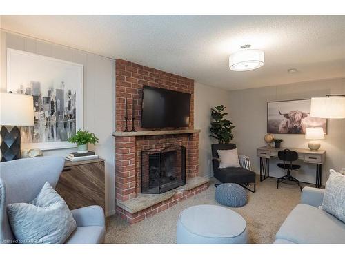 586 Hayward Crescent, Milton, ON - Indoor Photo Showing Living Room With Fireplace