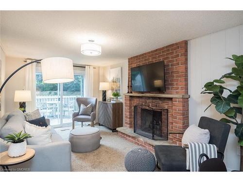 586 Hayward Crescent, Milton, ON - Indoor Photo Showing Living Room With Fireplace