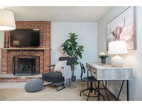 586 Hayward Crescent, Milton, ON - Indoor Photo Showing Living Room With Fireplace