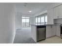 905-450 Dundas Street E, Waterdown, ON  - Indoor Photo Showing Kitchen 